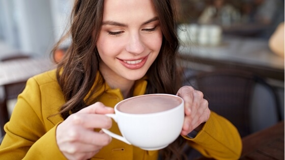 woman drinking coffee