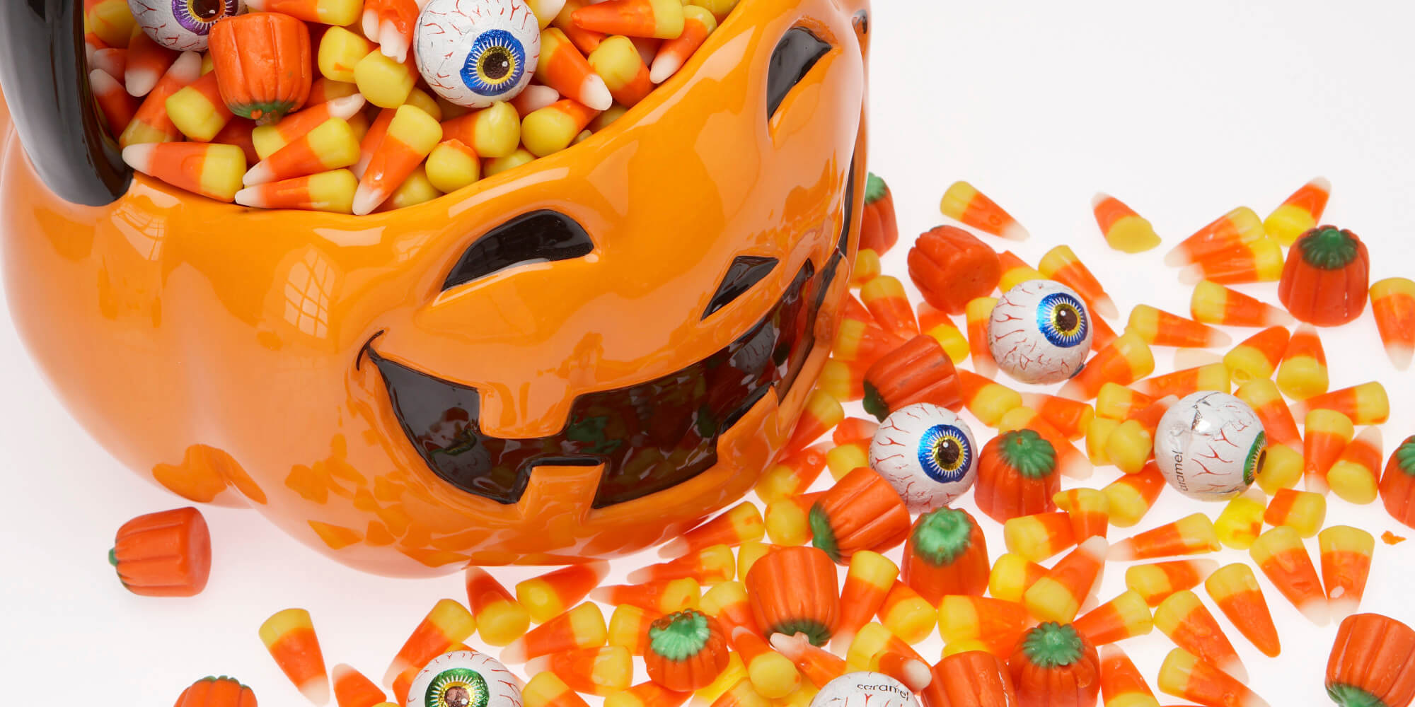 Halloween basket overflowing with candy corn