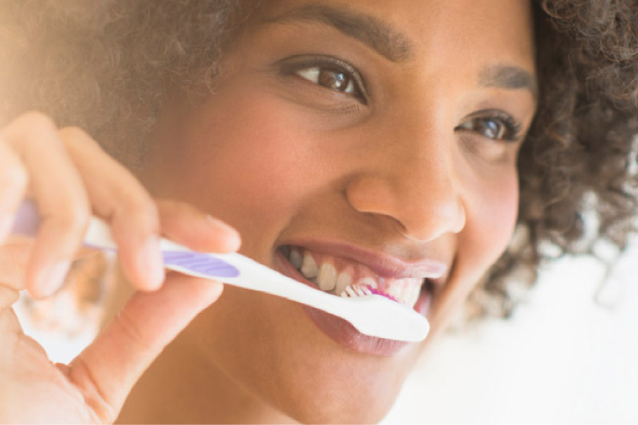 Brushing her teeth