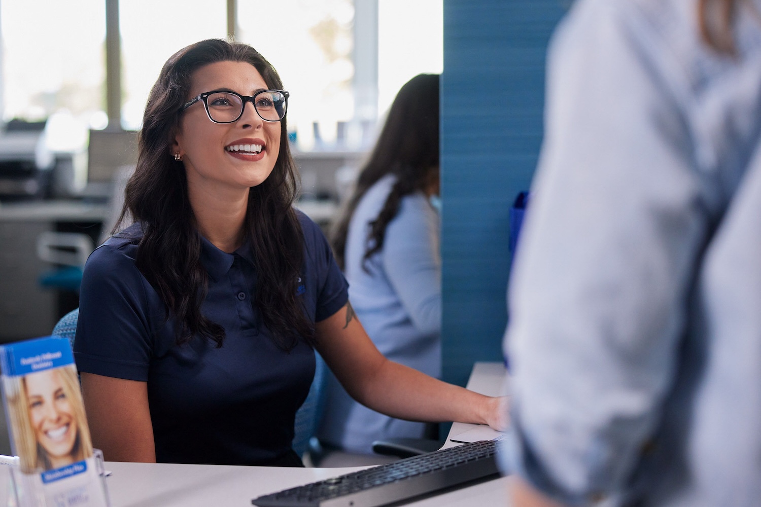 carolinasdentist welcoming patient for their year-end dental checkup