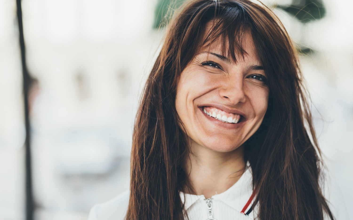 Brunette woman with a gummy smile