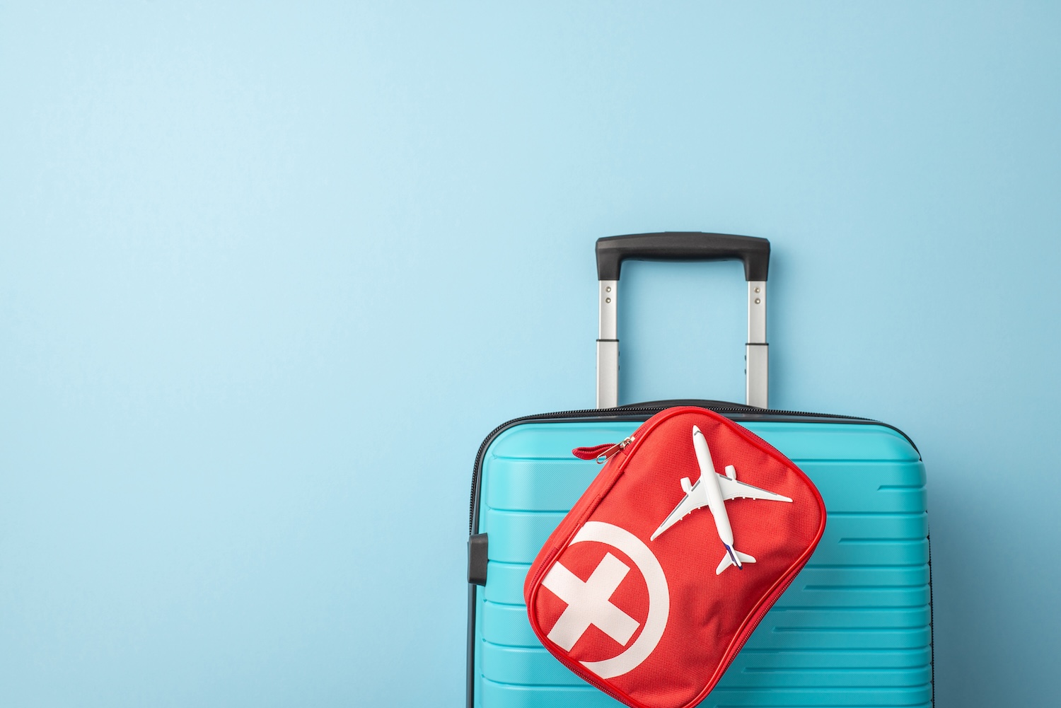 suitcase with travel emergency kit, dental emergency on vacation, dental emergency while traveling