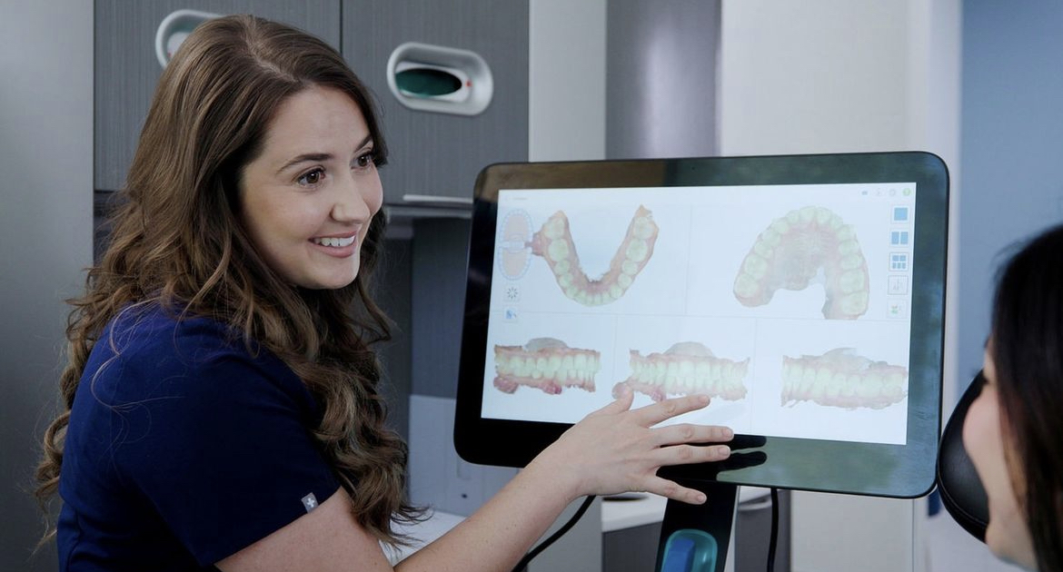 doctor discussing smile makeover with a patient