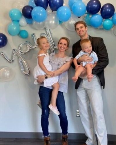 carolinasdentist-article-garner-4 Dr. Harn and her family under balloons at the grand opening of CarolinasDentist in Garner, NC