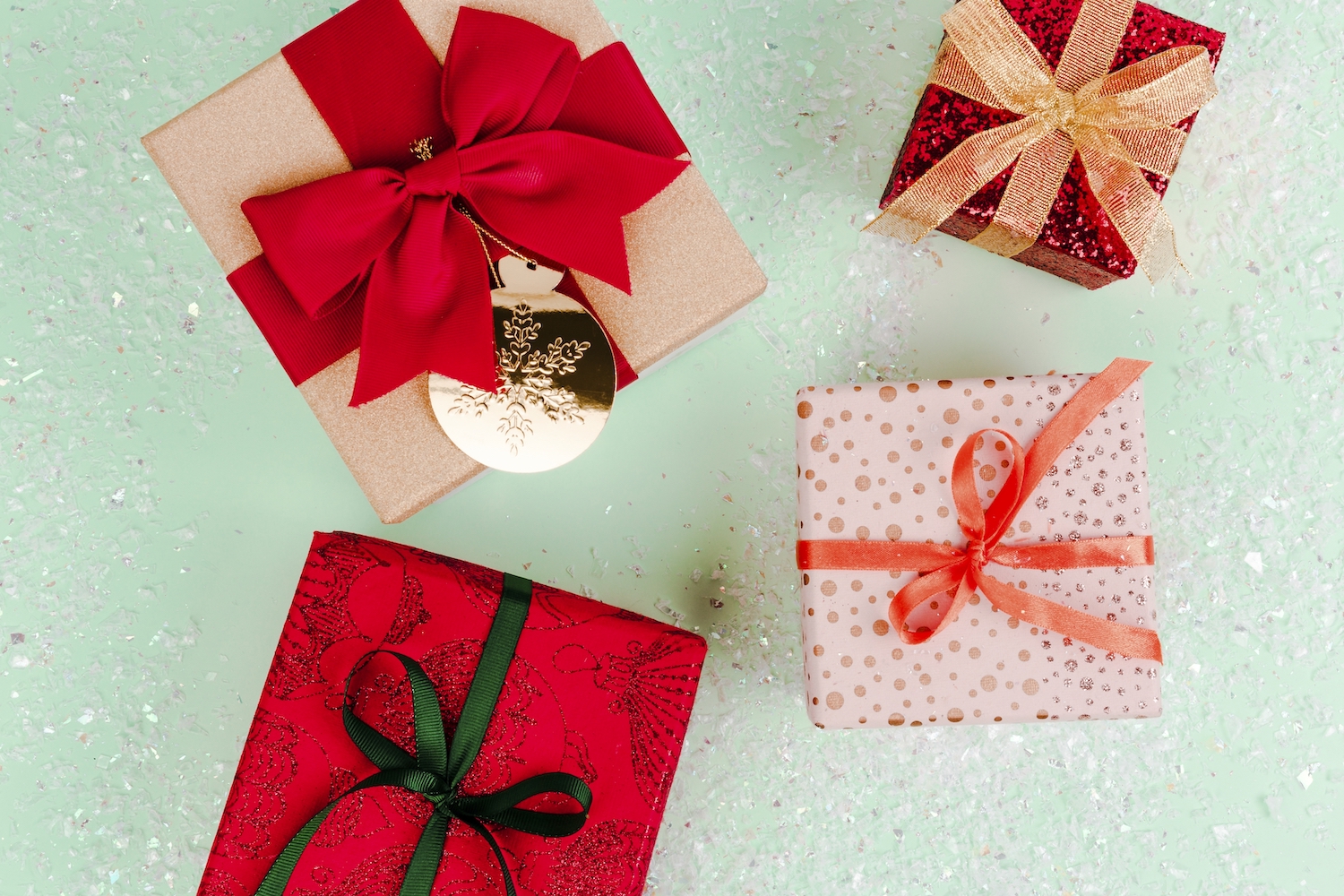 Aerial view of Christmas presents with dental-related gifts inside